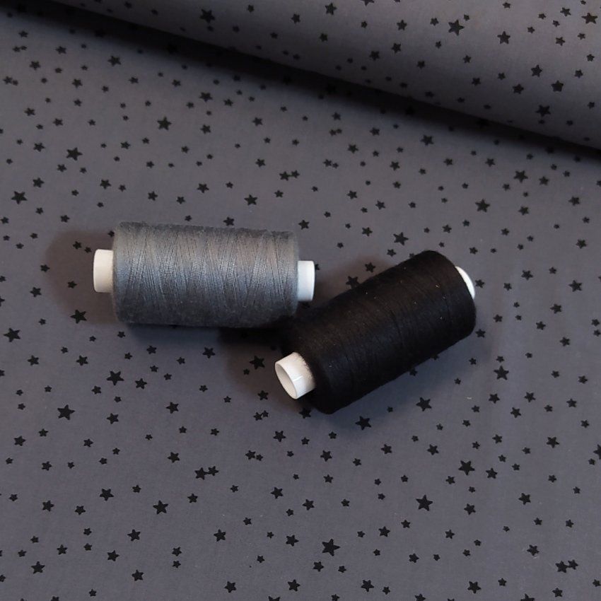 e029 gris con estrellitas negras a